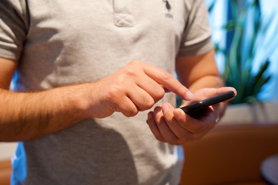 smartphone touchscreen typing close up
