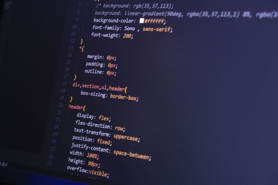 software developer computer screen code editor dark mode