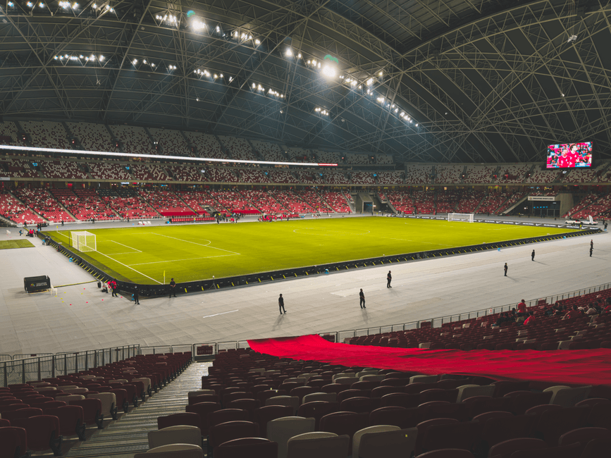 football stadium floodlights night match crowd