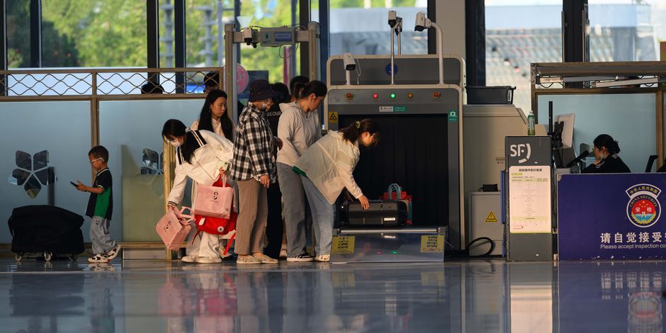 Thailand airport security checkpoint luggage scanning
