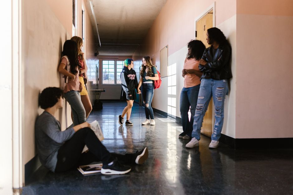 UK teenage student college hallway London