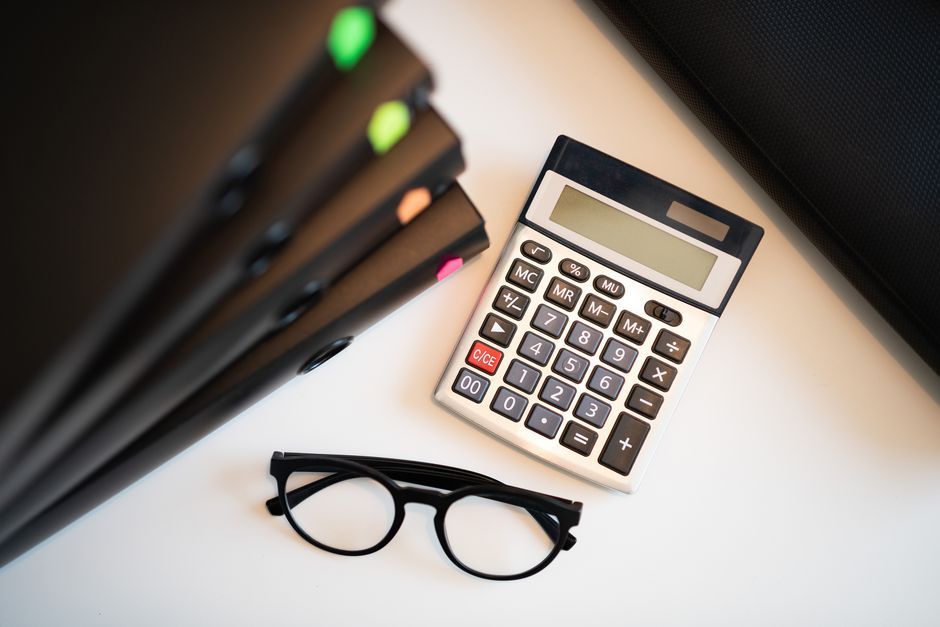 Thailand government agency office desk calculator documents
