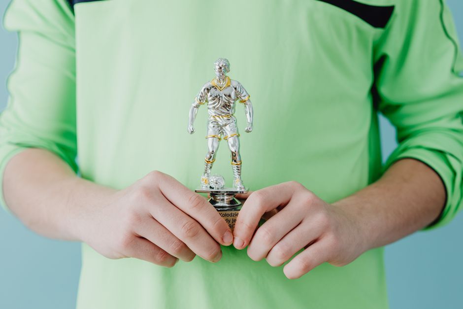 golden football trophy award close up