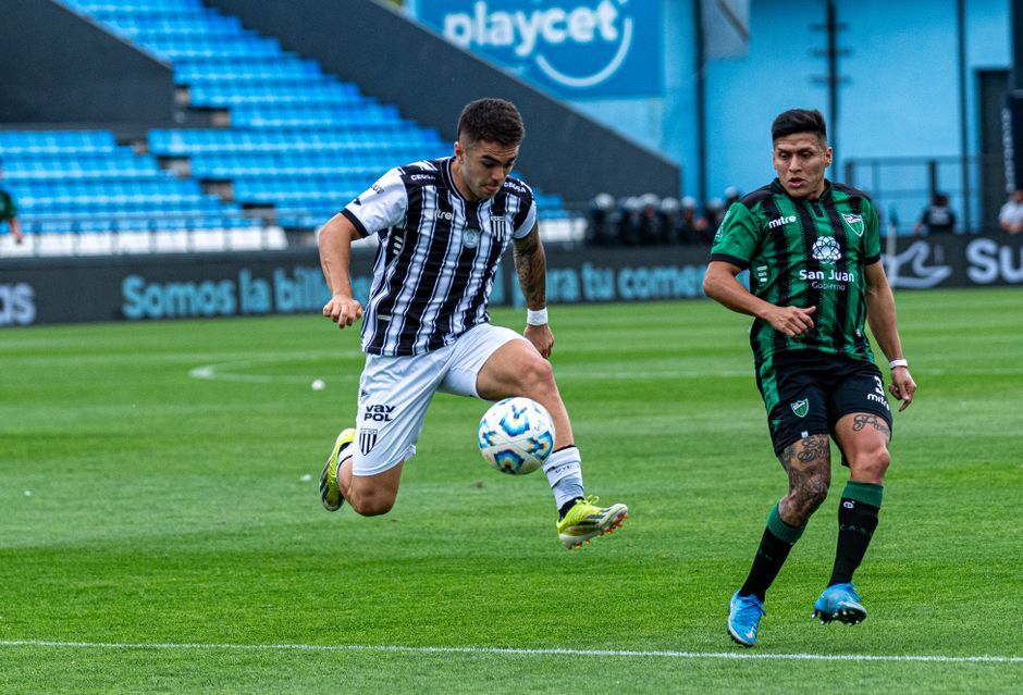 professional football players competing in stadium Thailand