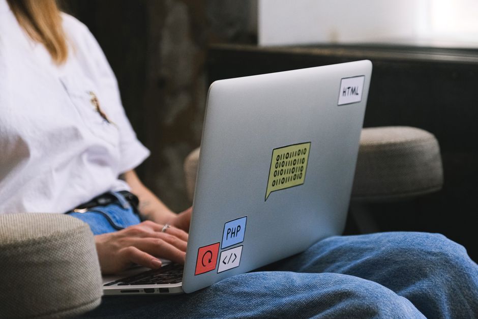 software developer working on laptop code ai