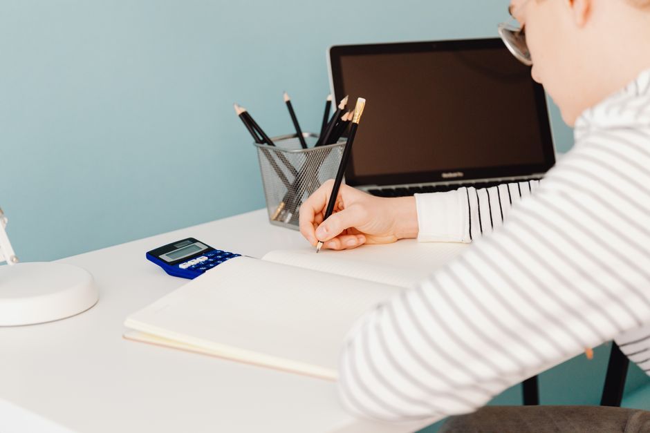 modern student desk laptop and stationery
