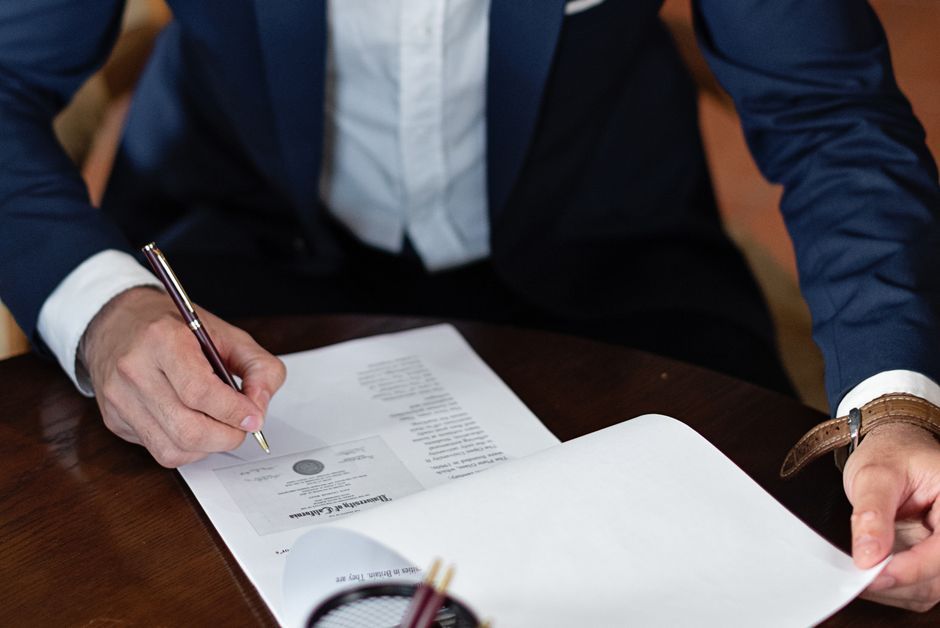 legal document pen signing notebook workspace