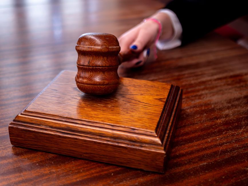 UK courtroom legal dispute gavel