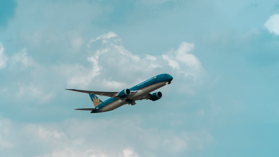 commercial aircraft airplane in flight sky