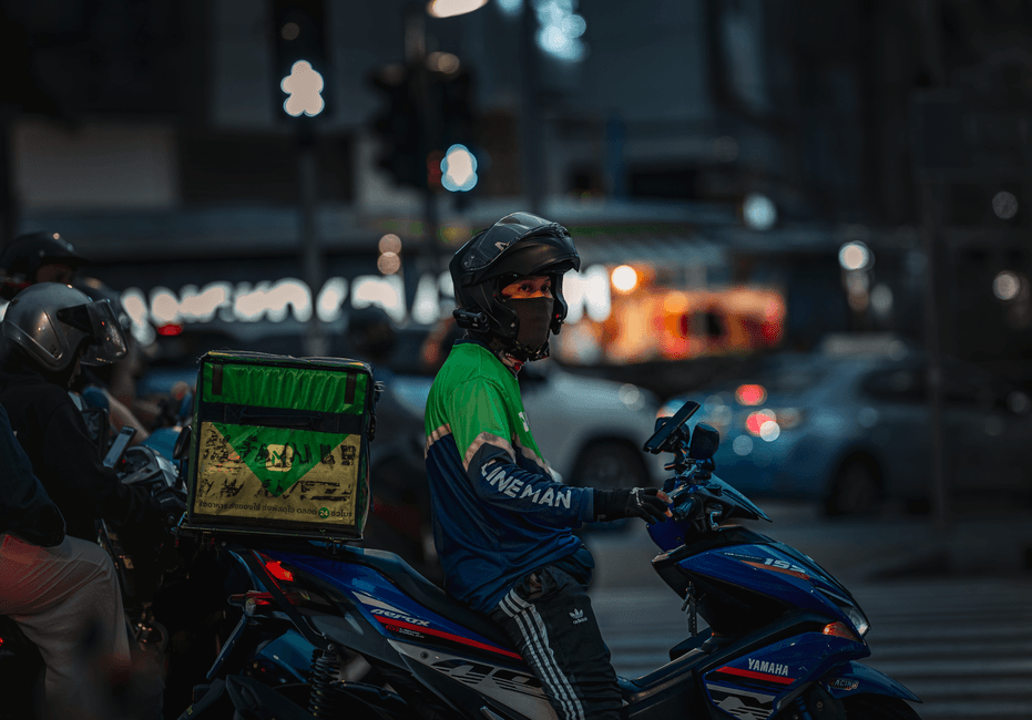 Bangkok street delivery worker Thailand