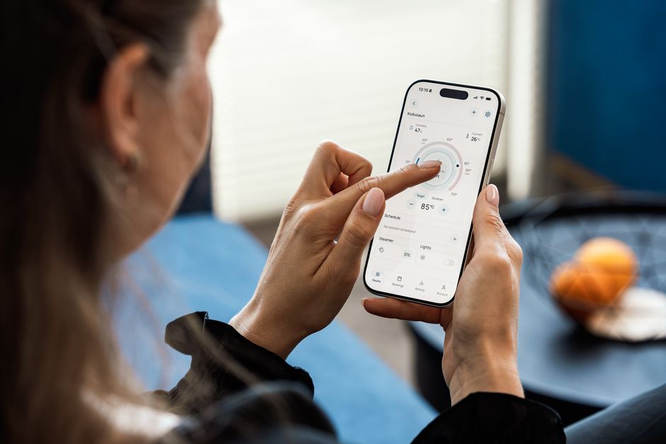 traveler using smartphone mobile app hotel booking
