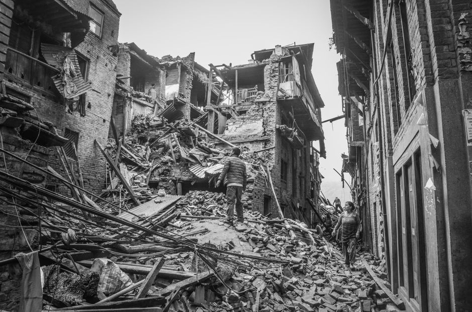 Nepal rescue workers mud debris disaster zone