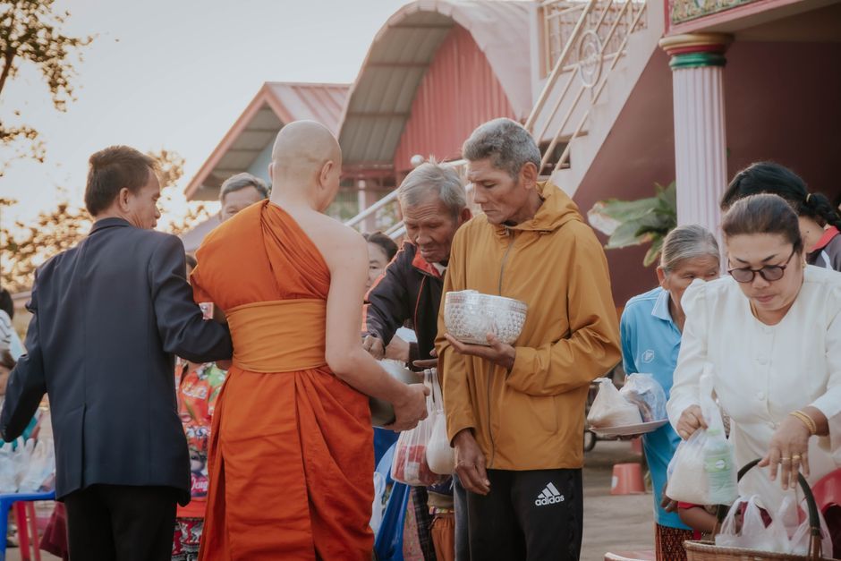 Buddhist monks alms giving Chao Phraya River