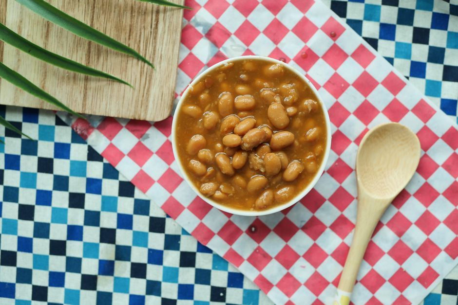 dry red beans wooden spoon bowl close up