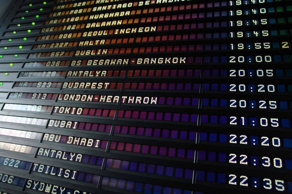 Vancouver International Airport departures board traveler