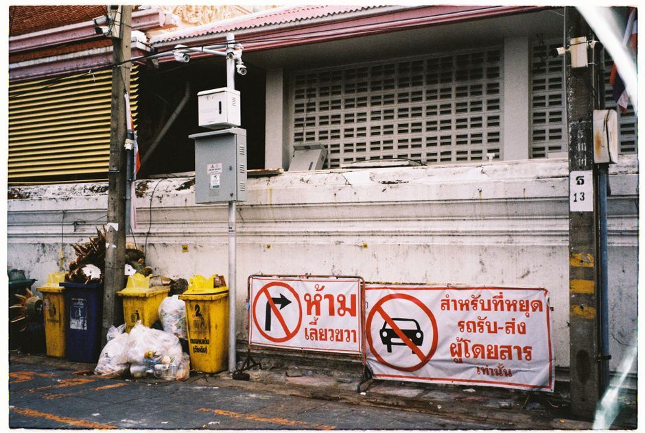 Bangkok urban street hazard debris Thailand