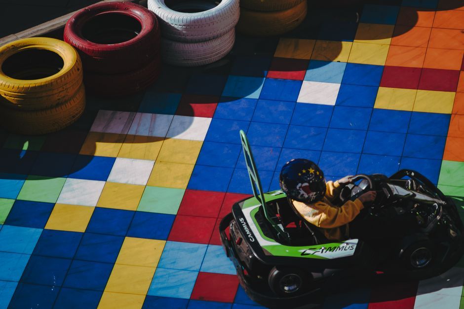 child on racing car
