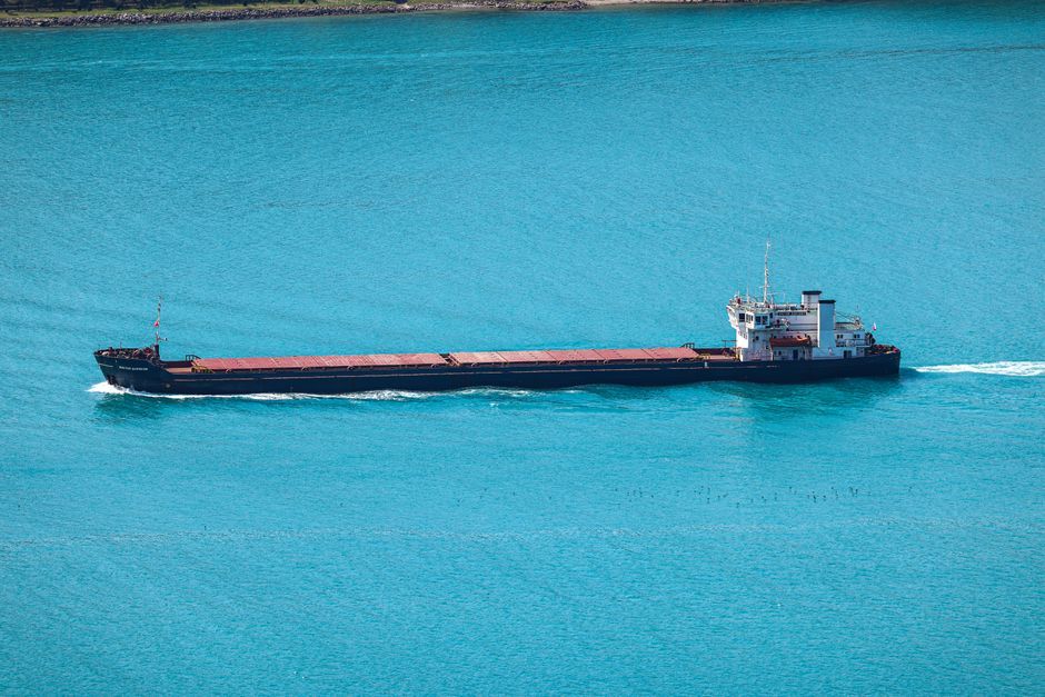 commercial cargo ship ocean waters