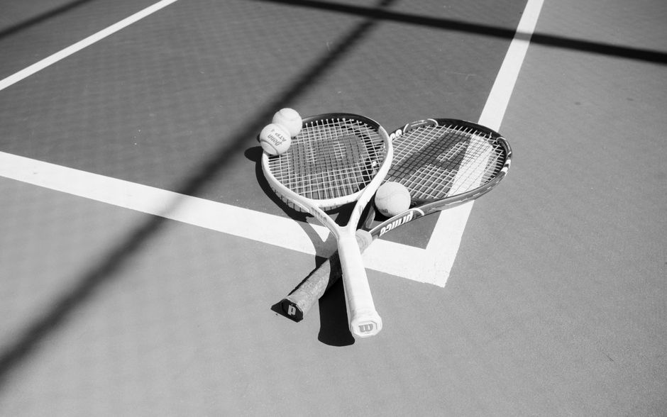tennis racket and ball on grass court Thailand