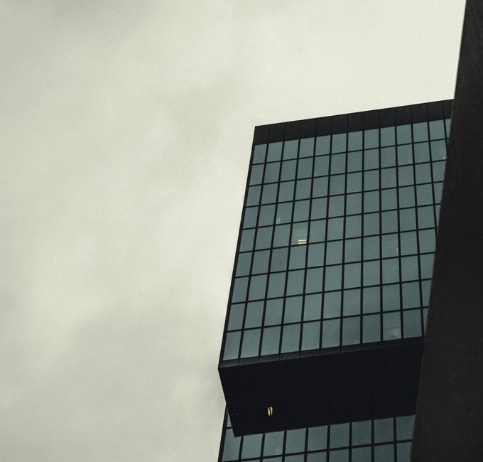 modern glass facade skyscraper office building exterior