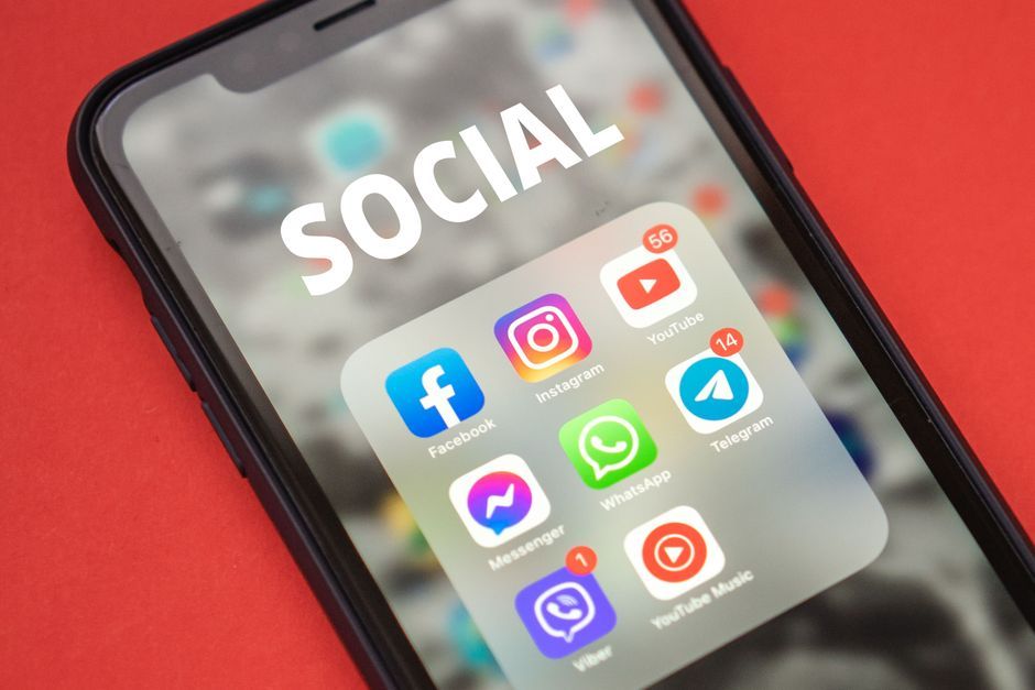 smartphone displaying social media engagement metrics