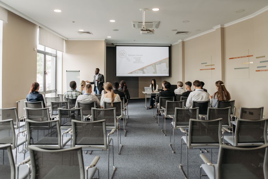 business conference speaker presentation screen daytime
