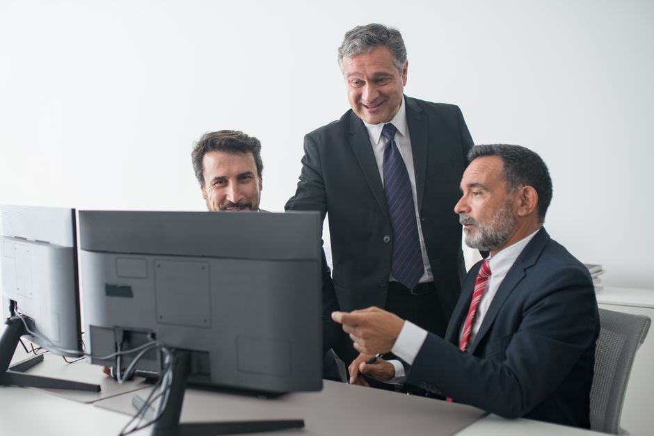 office workplace professional computer screen discussion