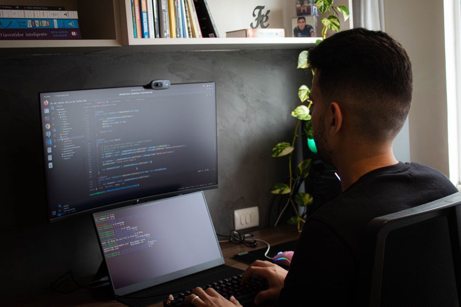 programmer workspace dual monitors code lines