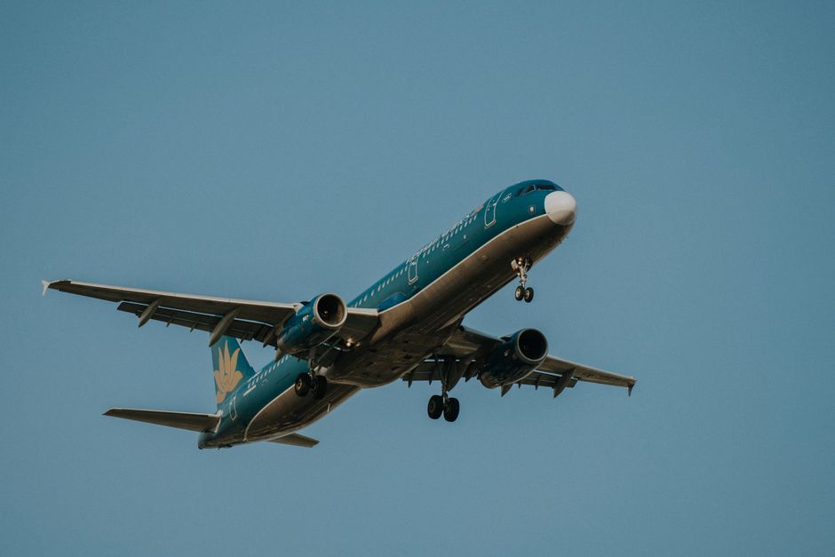 commercial airliner airplane in flight sky