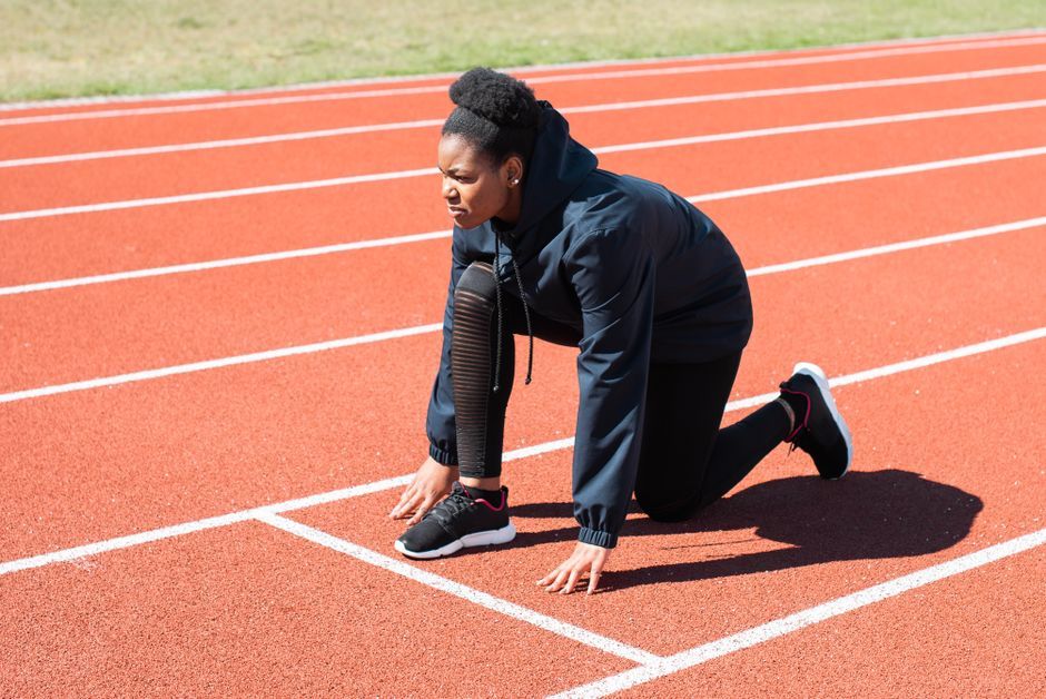 professional female runner training track