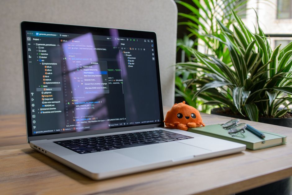 software developer office desk workspace notebook computer no logo