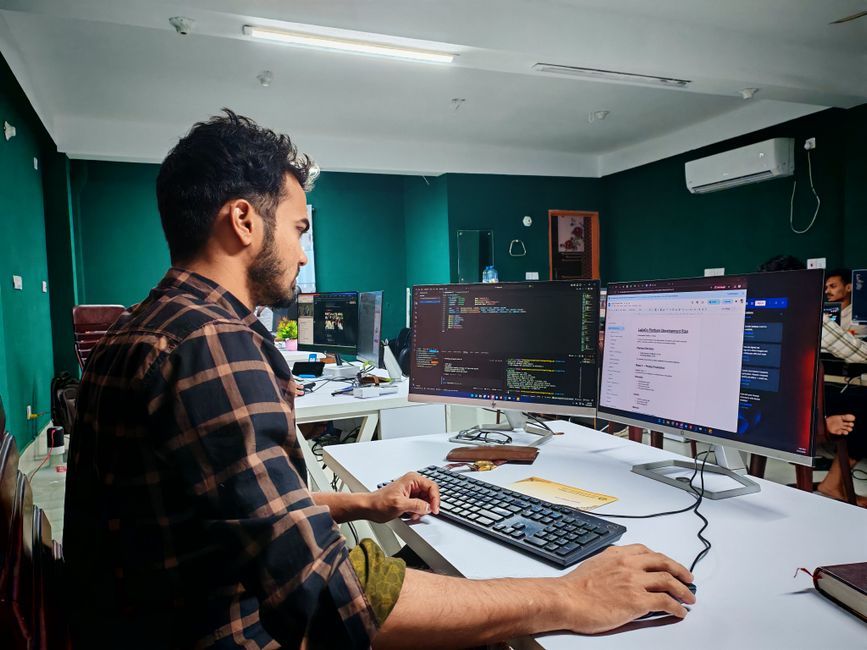 software developer office desk workspace