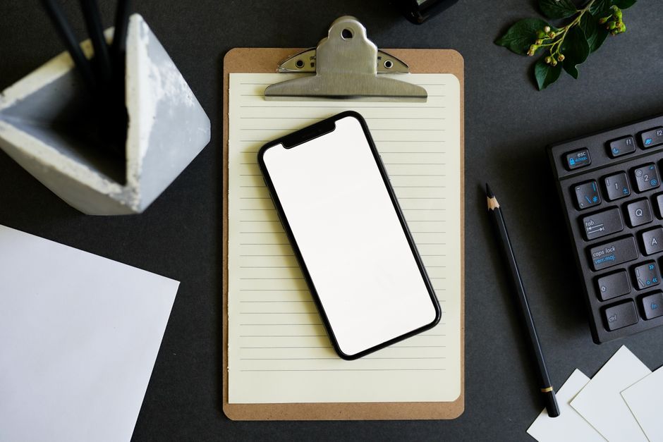 smartphone device prototype office desk workspace no logo