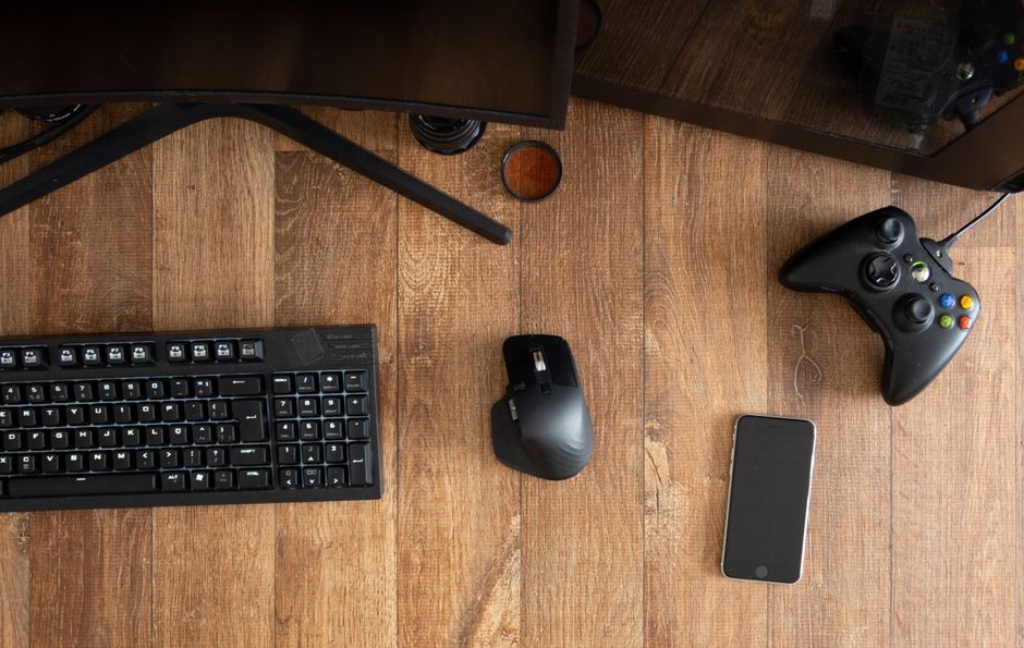 wireless gaming controller smartphone desk workspace