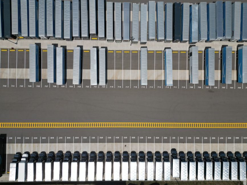 modern logistics warehouse truck fleet exterior