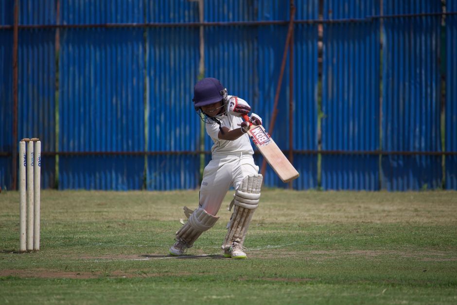 cricket match action field