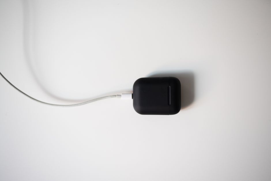 modern wireless earbuds charging case tech accessory