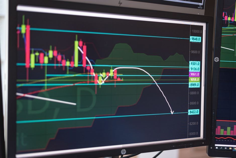 digital cryptocurrency trading chart screen office