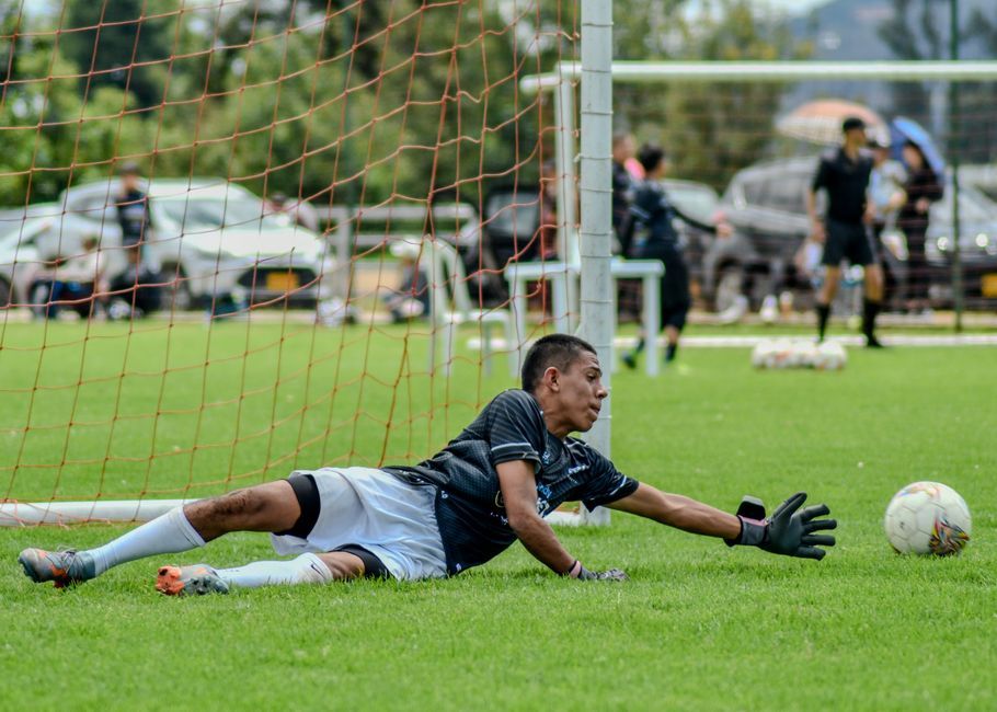 soccer goalkeeper training stadium pitch no team crest