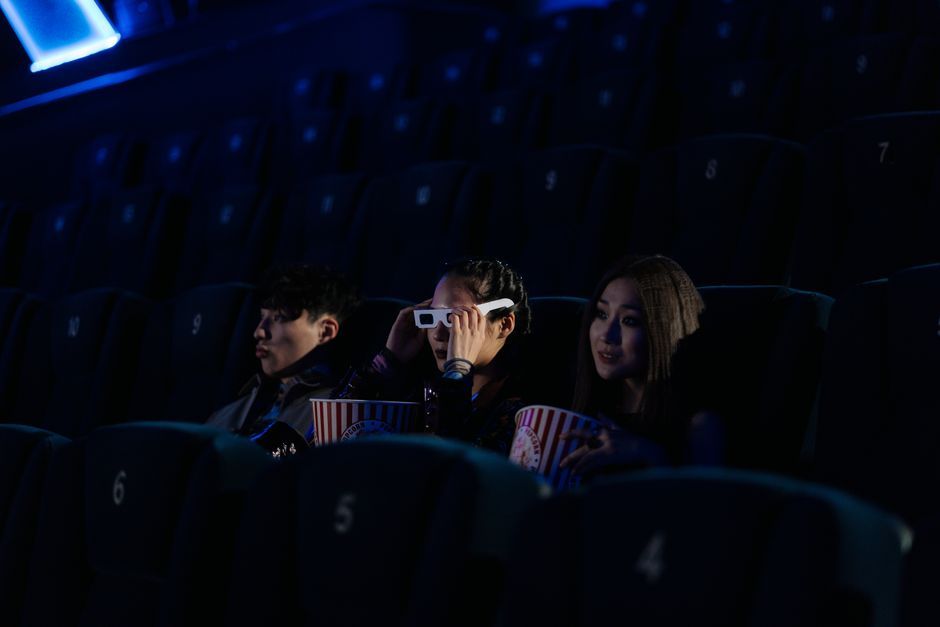 cinema film projector screen audience dark room