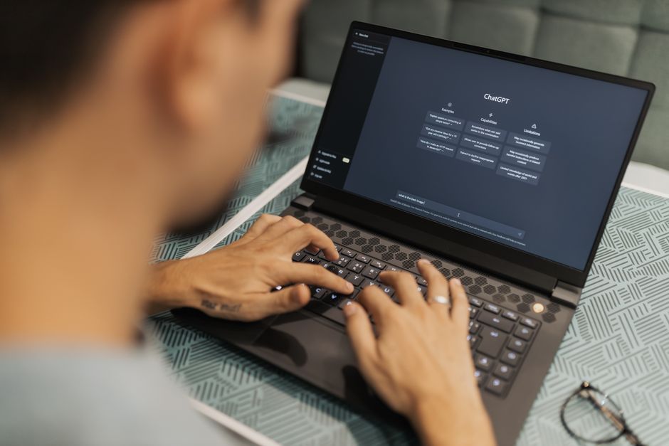 chatbot software screen laptop notebook computer office desk workspace
