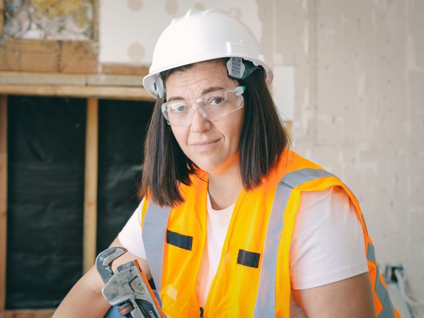 UK female plumber tools professional
