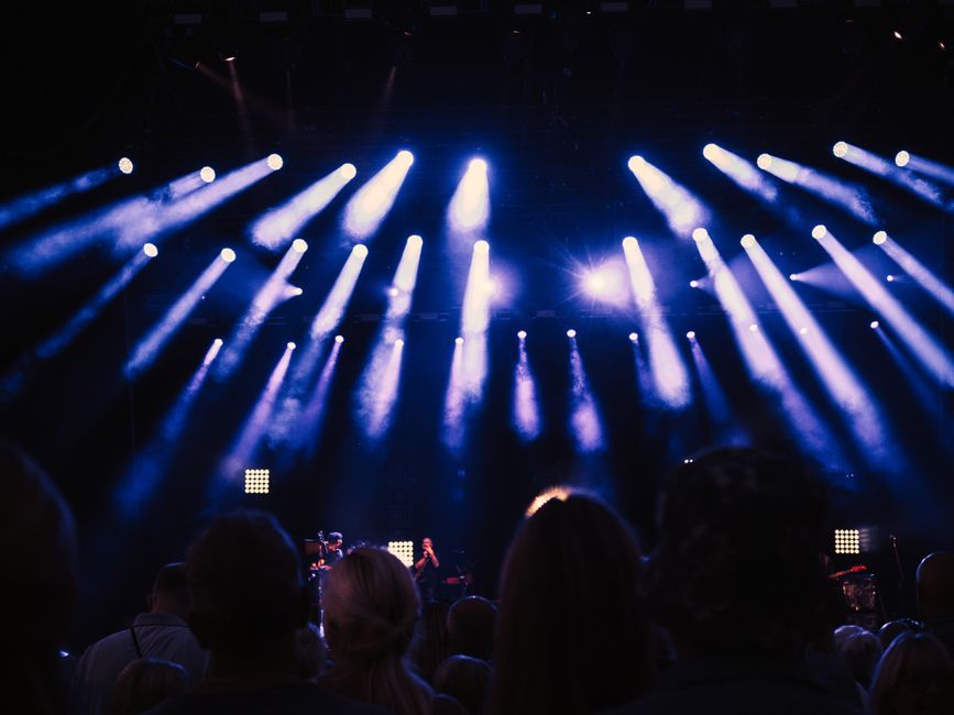 concert stage microphone live music performance crowd lighting