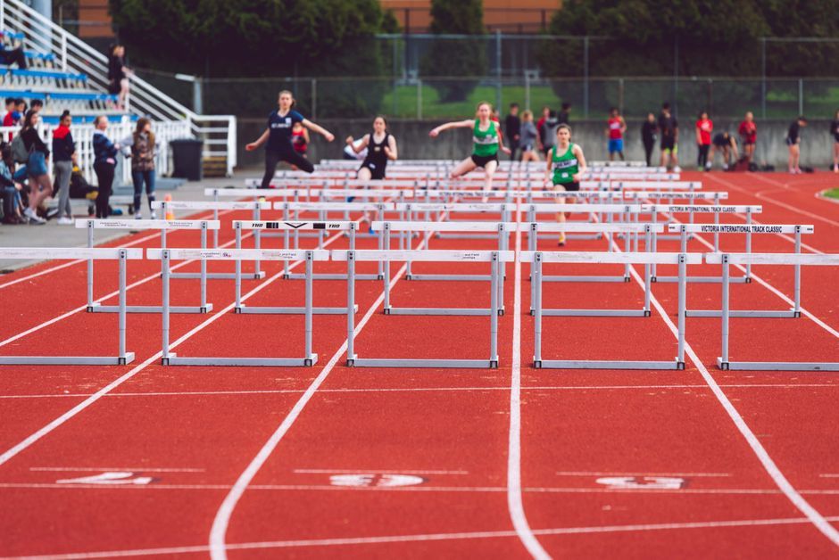 British sprinter running track Birmingham stadium