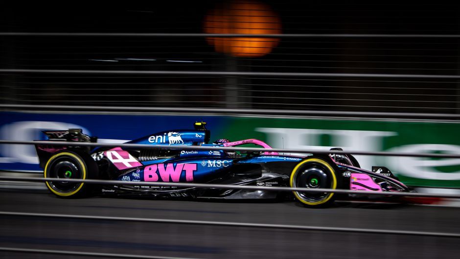 Formula 1 racing car Baku street circuit night match crowd no team crest