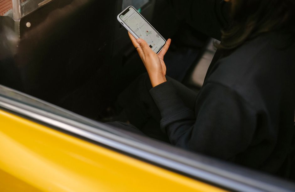 traveler using smartphone app airport