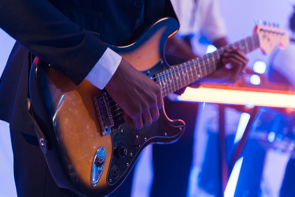musician playing electric guitar