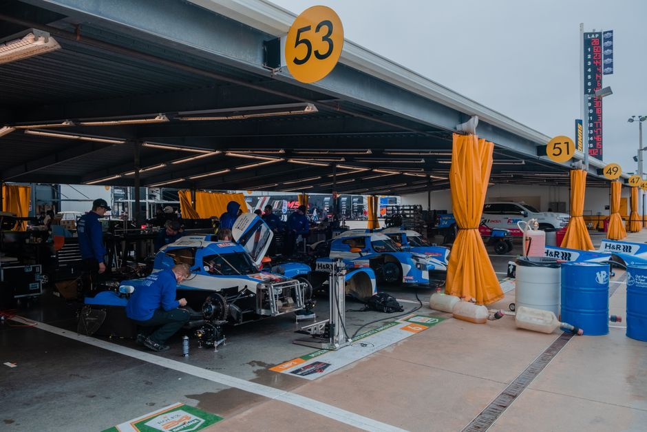 motorsport racing team garage paddock