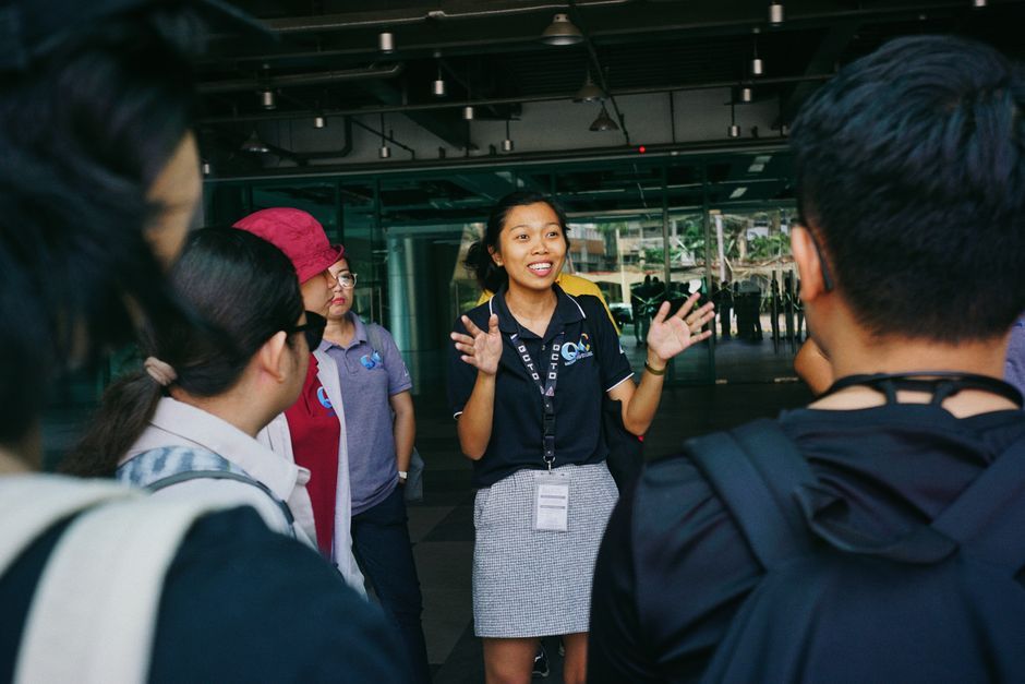 travel tour guide leading group city walking tour