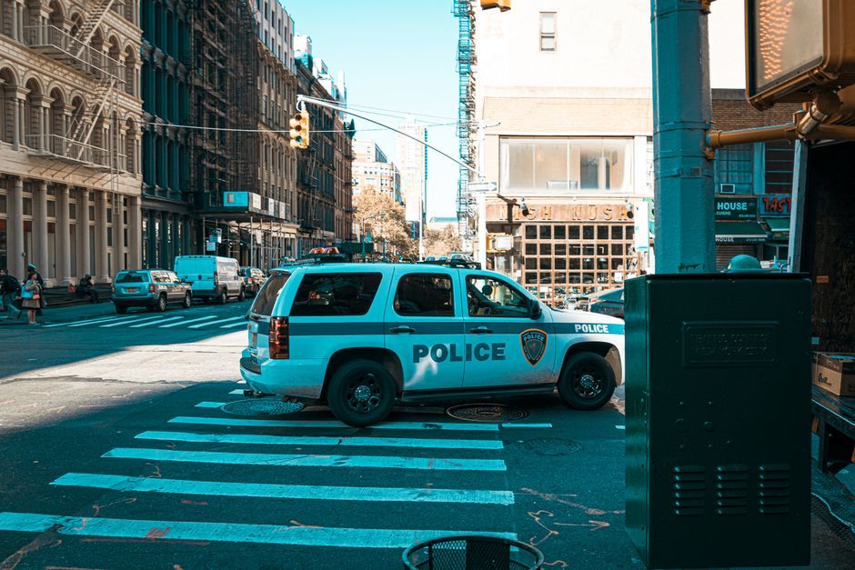 USA police car street neighborhood daytime